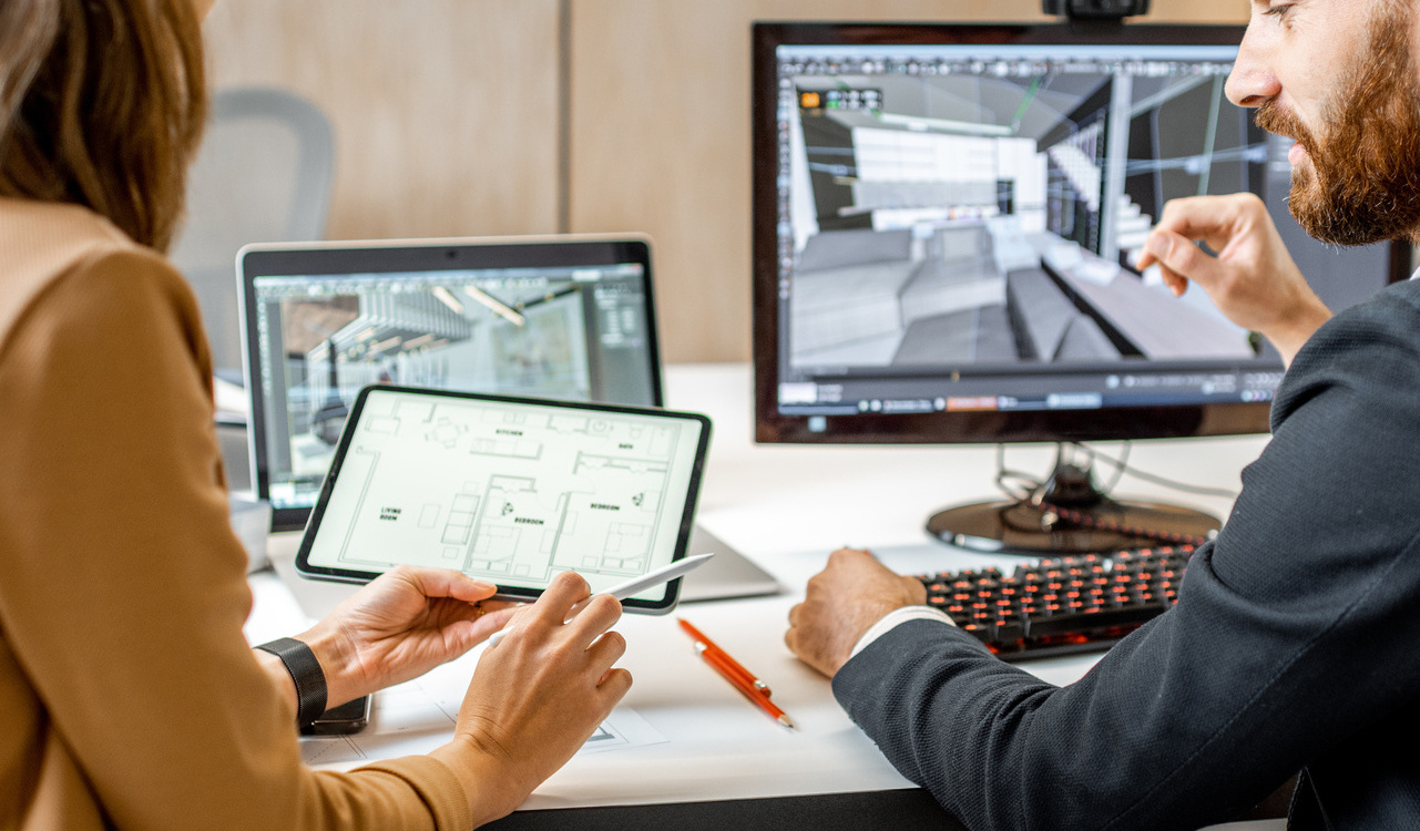 Two interior designers working in the office